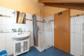 DG-Kinderbad1.2 - Ihr Traumhaus mit Weitblick – Eleganz, Komfort & pure Lebensqualität in malerischer Lage!