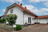 Titel Grolsheim - Beeindruckende Raumhöhe und optionale Einliegerwohnung. Stilvolles Architektenhaus in Grolsheim.