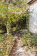 Garten-Zugang - Idyllisches Einfamilienhaus: Perfekt für Familien mit Garten, Studio und Hobby-Werkstatt oder Garage