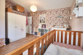 Kinderzimmer2 - Erleben Sie Ihr Traumhaus mit Einliegerwohnung in malerischer Umgebung.