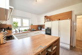 Küche2 - Erleben Sie Ihr Traumhaus mit Einliegerwohnung in malerischer Umgebung.