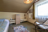 DG Kinderzimmer 2.1 - Wörrstadt: Vielseitiges Einfamilienhaus mit Mehrgenerationen-Option & Schwimmbad-Potenzial