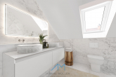DG Badezimmer Beispiel 1.1 - Architektenvilla in Grolsheim mit außergewöhnlicher Raumhöhe und Eleganz. Einliegerwohnung möglich.
