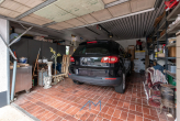 Garage - Architektenvilla in Grolsheim mit außergewöhnlicher Raumhöhe und Eleganz. Einliegerwohnung möglich.