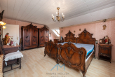 DG Schlafzimmer1.3 - Architektenvilla in Grolsheim mit außergewöhnlicher Raumhöhe und Eleganz. Einliegerwohnung möglich.