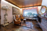 EG Wohnzimmer1.5 Kamin - Saulheim: Stilvoller Bungalow mit 926 qm Grundstück, Gartenparadies, Feldrand !