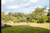 Garten - Traumhaftes Einfamilienhaus mit Einliegerwohnung, Feldrandlage und Doppelgarage mit Grube