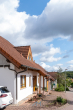 Ansicht-Seite - Traumhaftes Einfamilienhaus mit Einliegerwohnung, Feldrandlage und Doppelgarage mit Grube