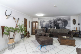 EG Wohnzimmer1.2 - Ihr Zuhause wartet in Gau-Odernheim: Einfamilienhaus mit großer Terrasse & geräumiger Garage!