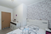 DG-Schlafen2.4 - Ihr Zuhause wartet in Gau-Odernheim: Einfamilienhaus mit großer Terrasse & geräumiger Garage!