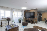 EG Wohnzimmer1.1 - Ihr Zuhause wartet in Gau-Odernheim: Einfamilienhaus mit großer Terrasse & geräumiger Garage!